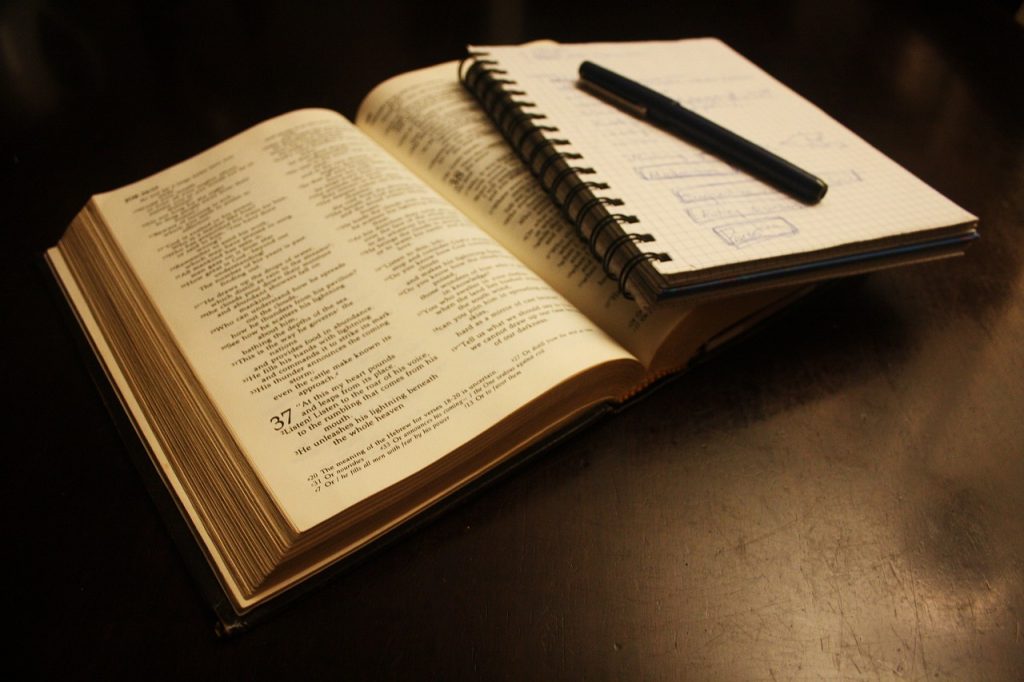 Bible, Notebook and Pen