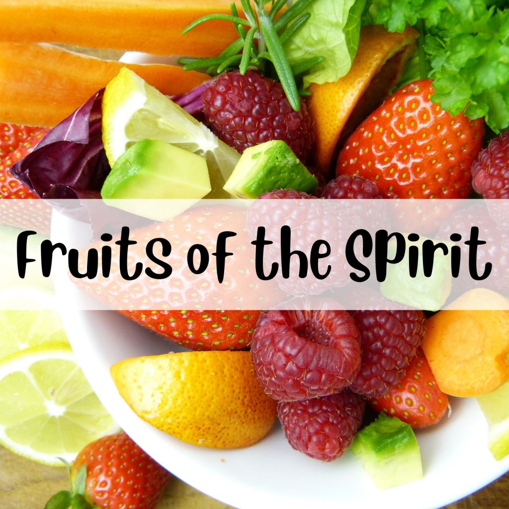 Fruits of the Spirit Banner text overlay on a bowl of fruit
