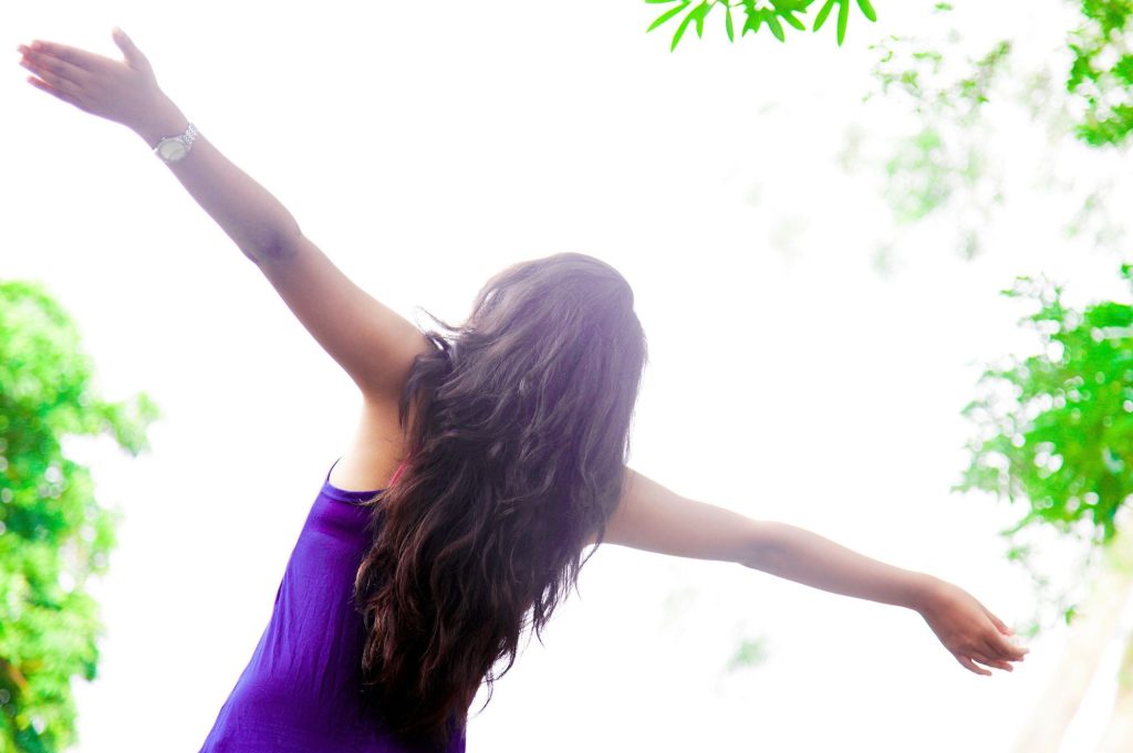 A woman who has broken free from the world's chains and is enjoying freedom through God's Word